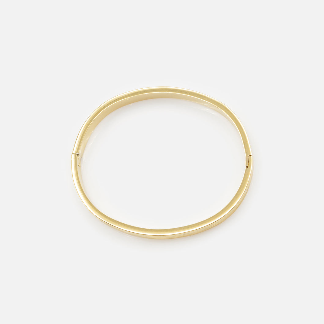 Bracelet rigide doré à rainures en acier inoxydable