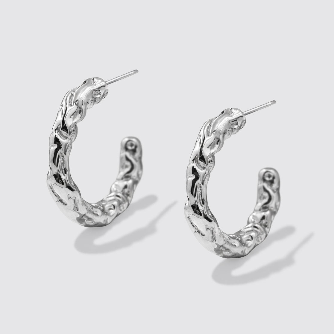 Boucles d'oreilles anneaux texture organique argentés en acier inoxydable