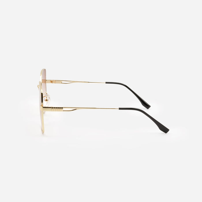 Lunettes de soleil dorées avec verres pâles