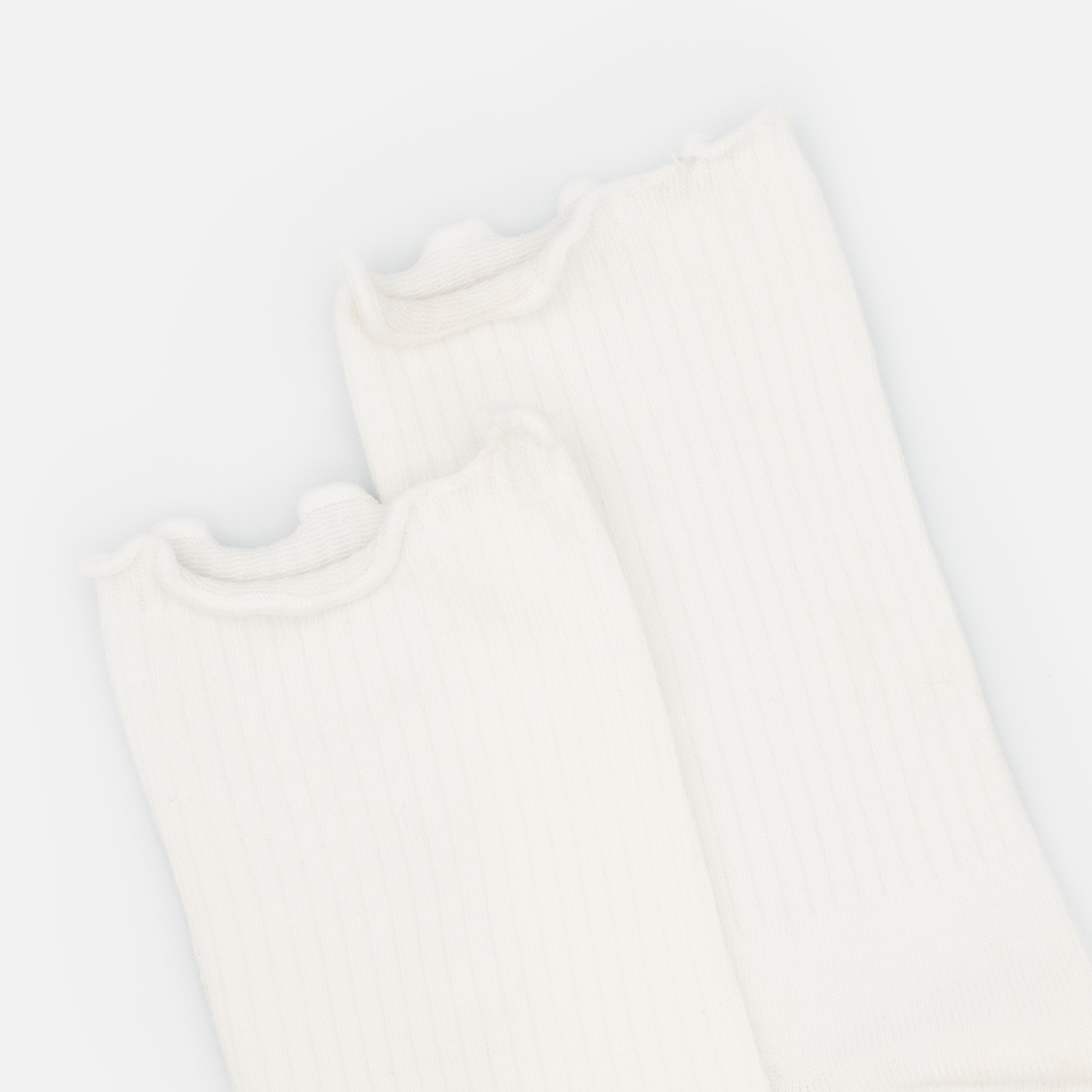 White stockings with wavy trim
