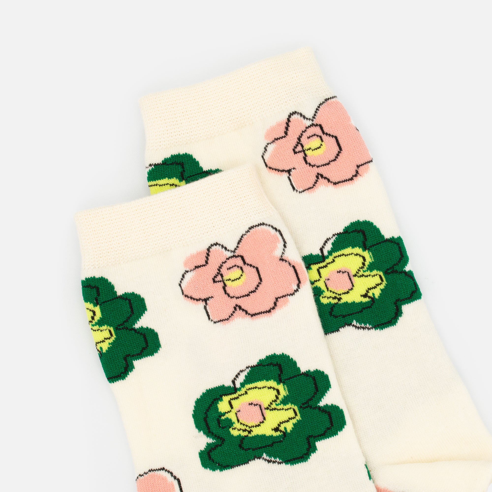 Beige stockings with sketches of pink and green flowers