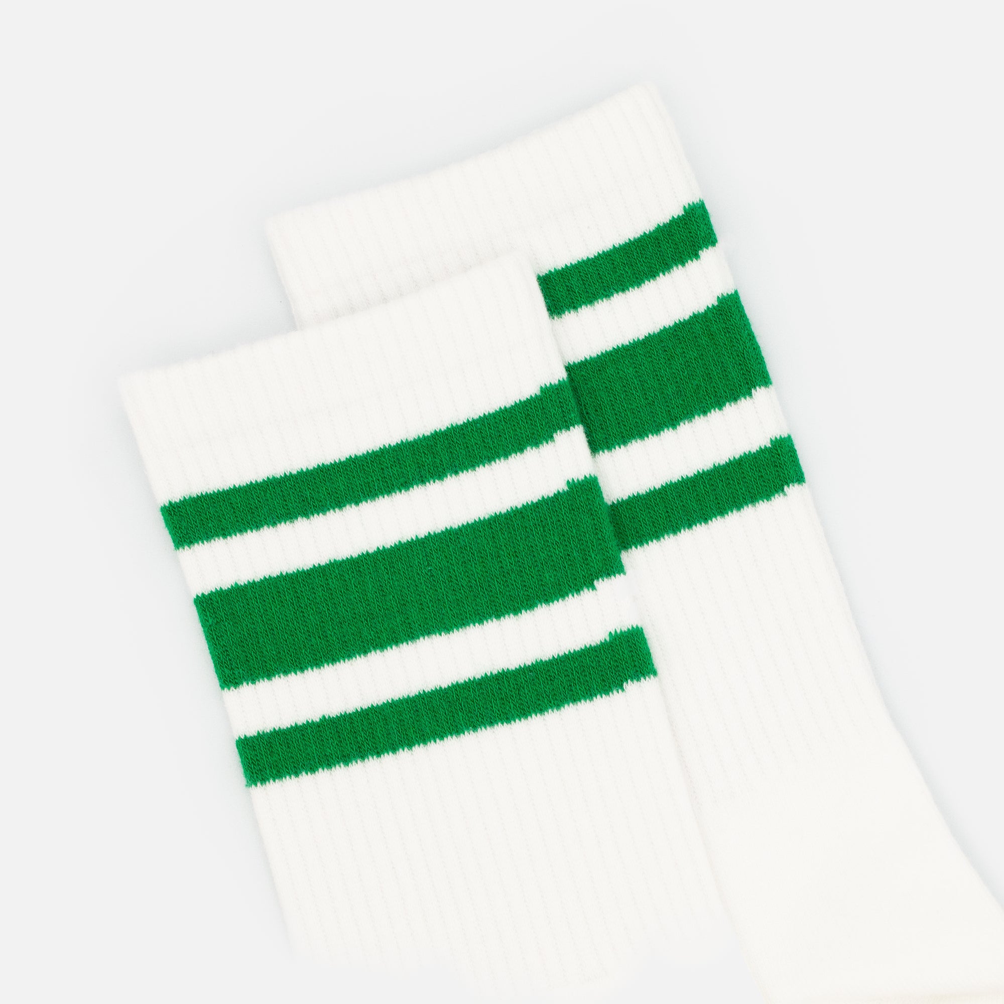 White ribbed socks with emerald stripes