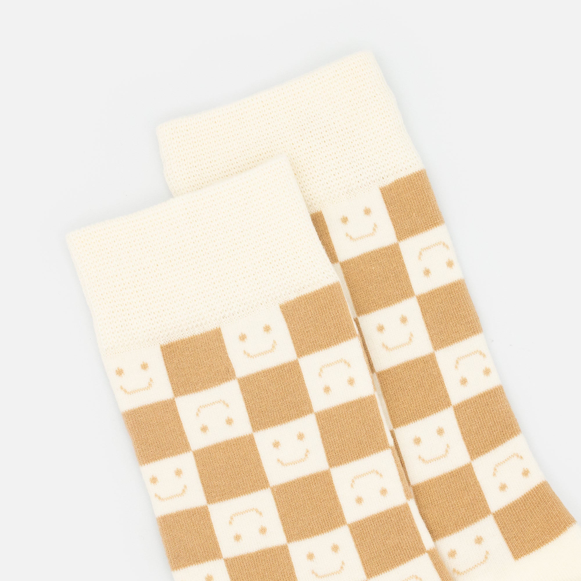 Bas damier beige et blanc avec sourires