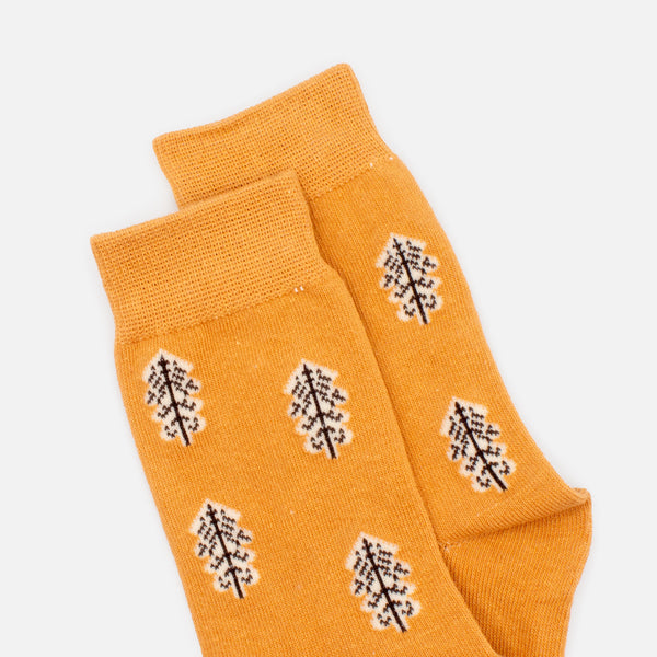 Load image into Gallery viewer, Mustard yellow stockings with tree print
