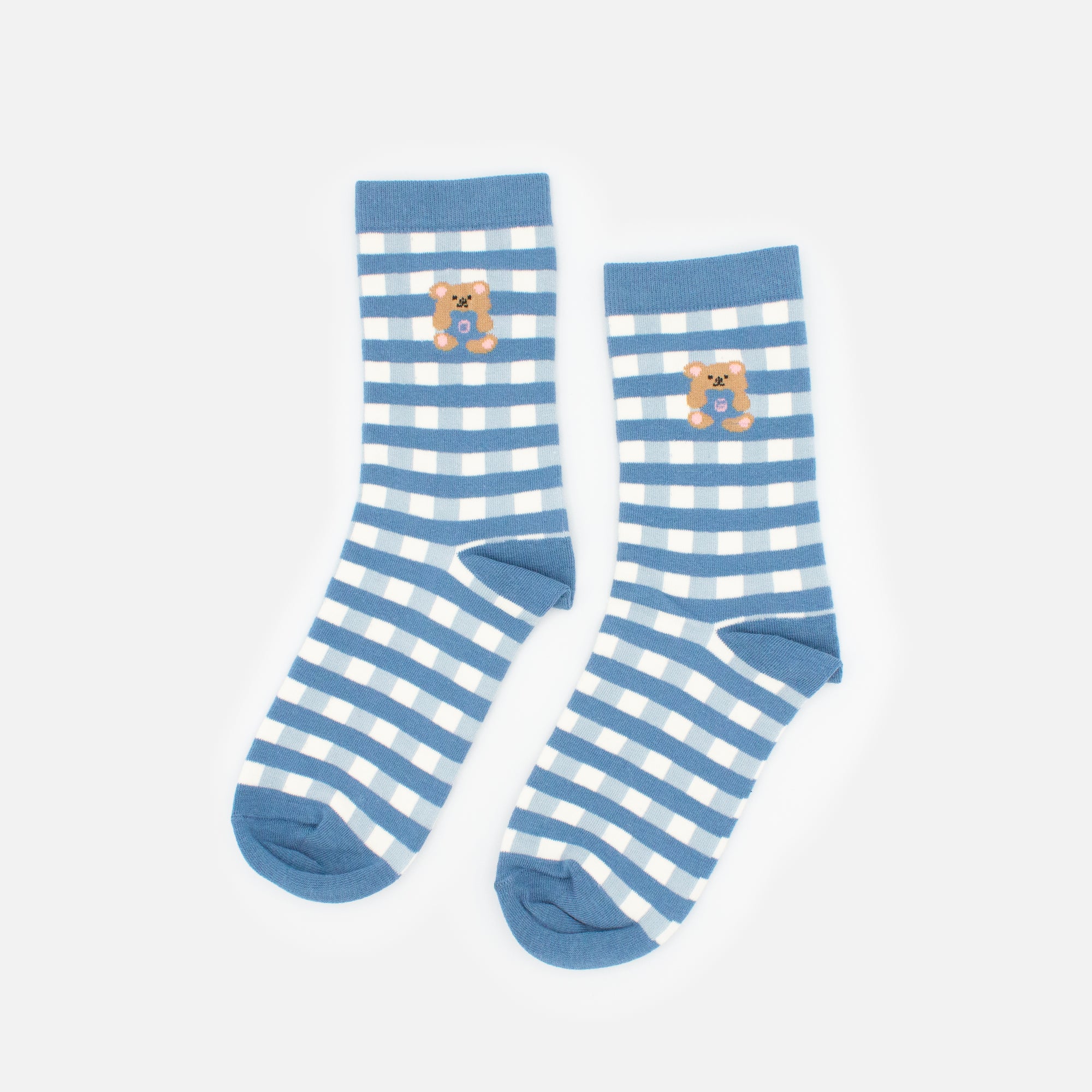 Blue and white checkered stockings with teddy bear