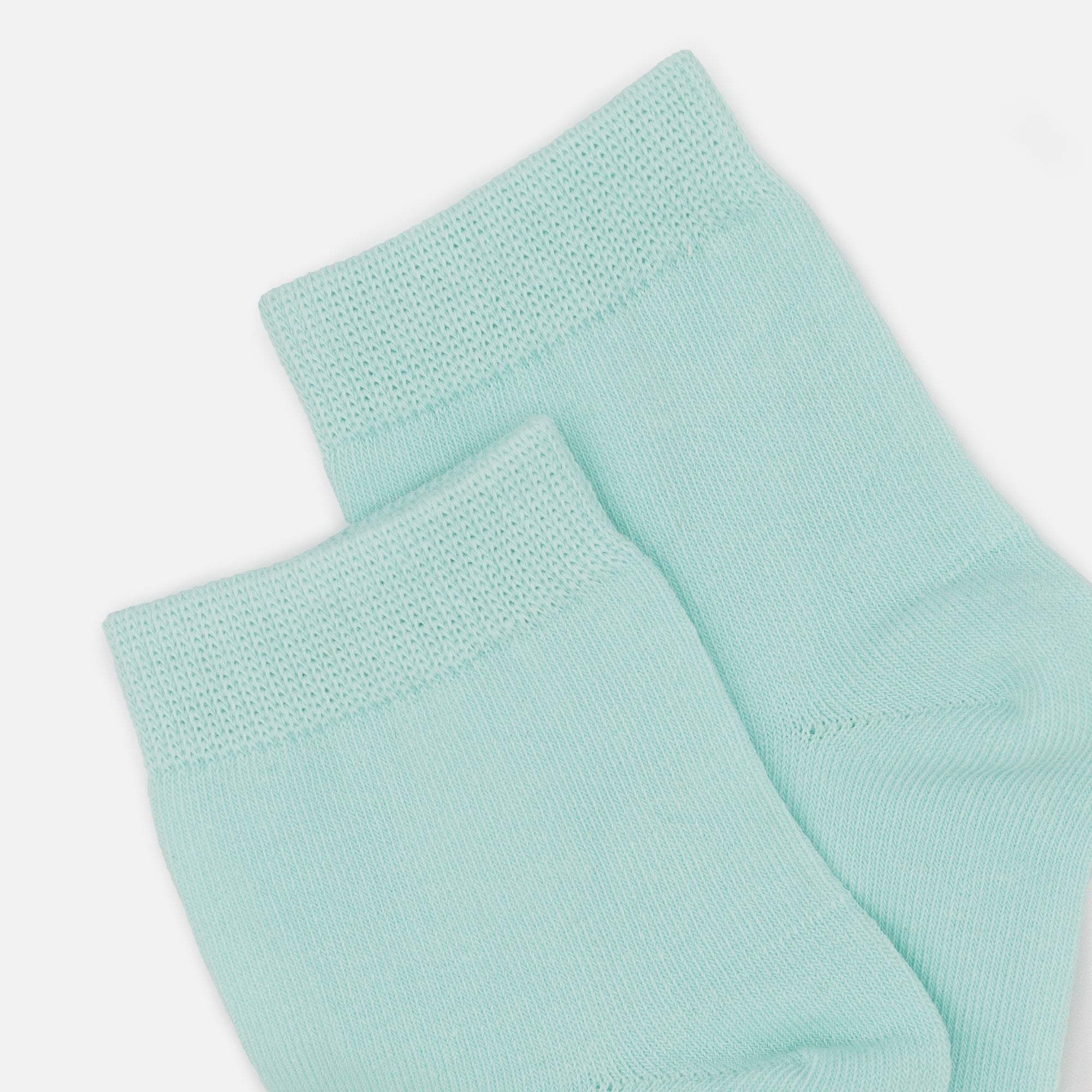 Mid-length turquoise stockings with band trim
