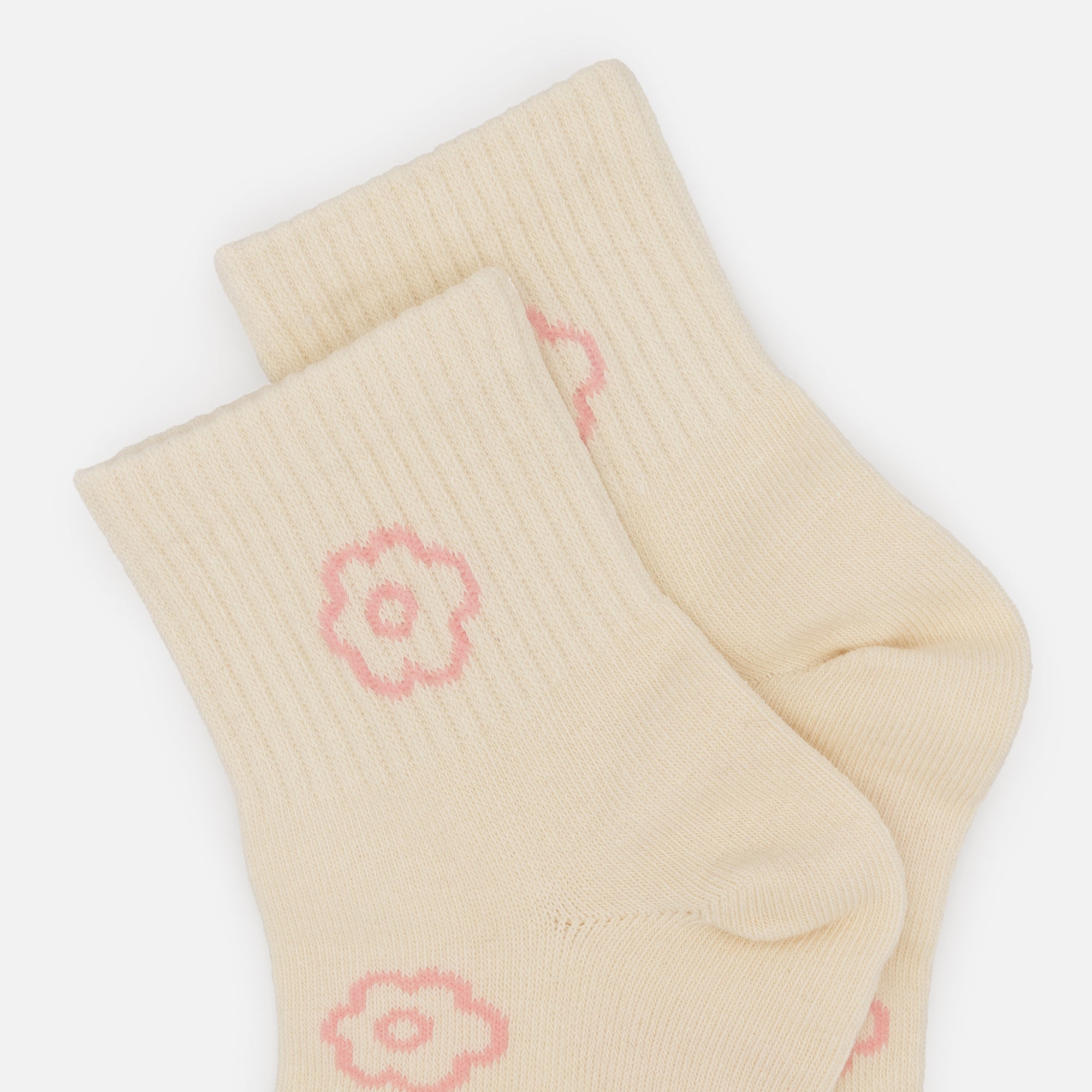 Mid-length cream stockings with pale pink empty flowers