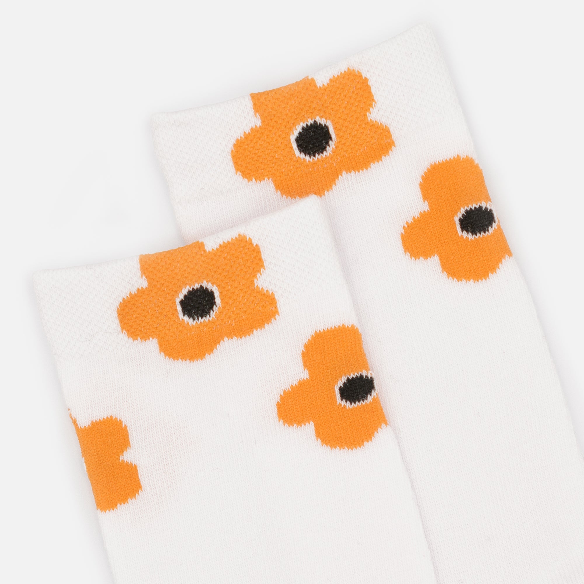 White stockings with orange flowers