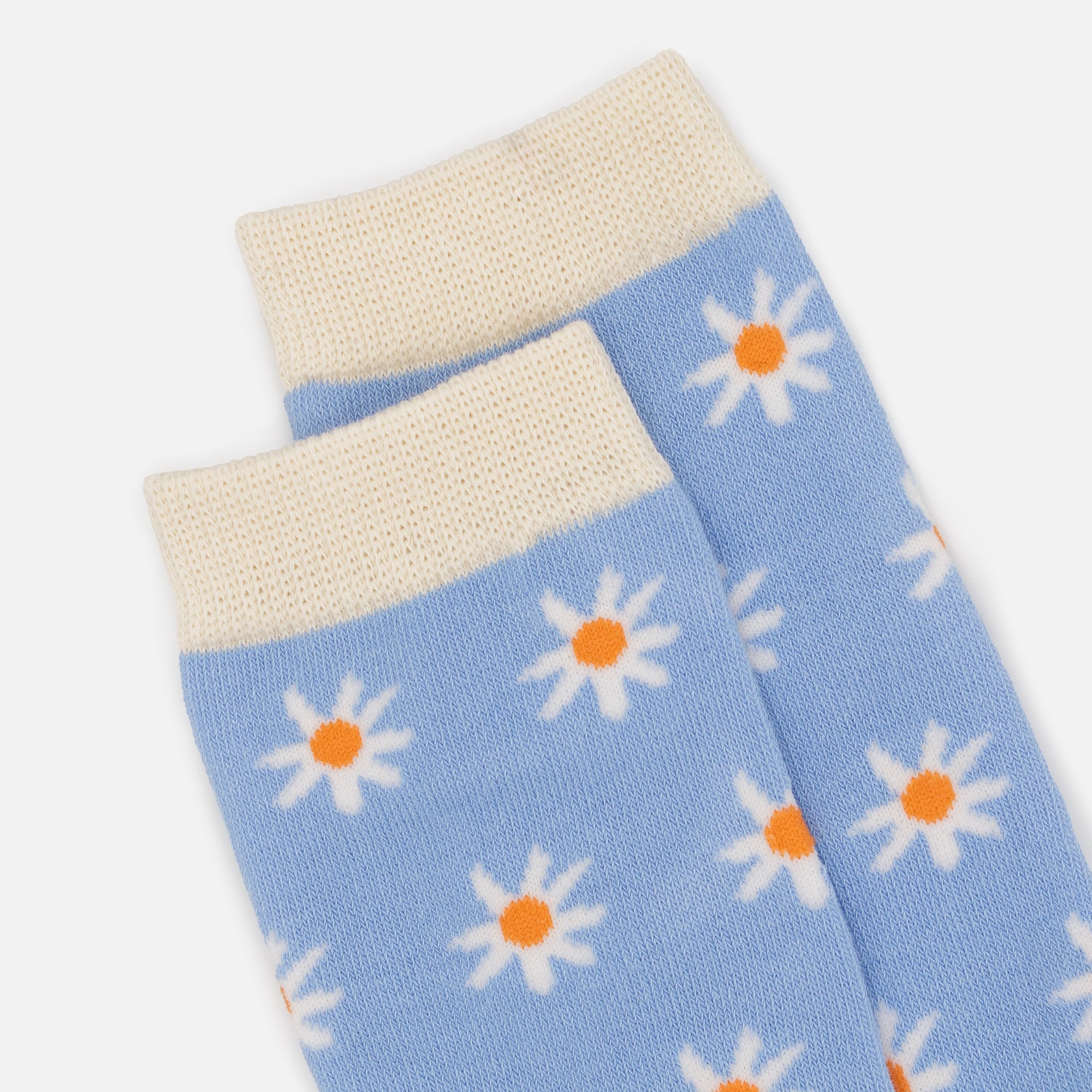 Pale blue stocking with white flowers and cream trim
