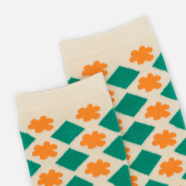 Load image into Gallery viewer, Cream stockings with green diamond patterns and orange flowers
