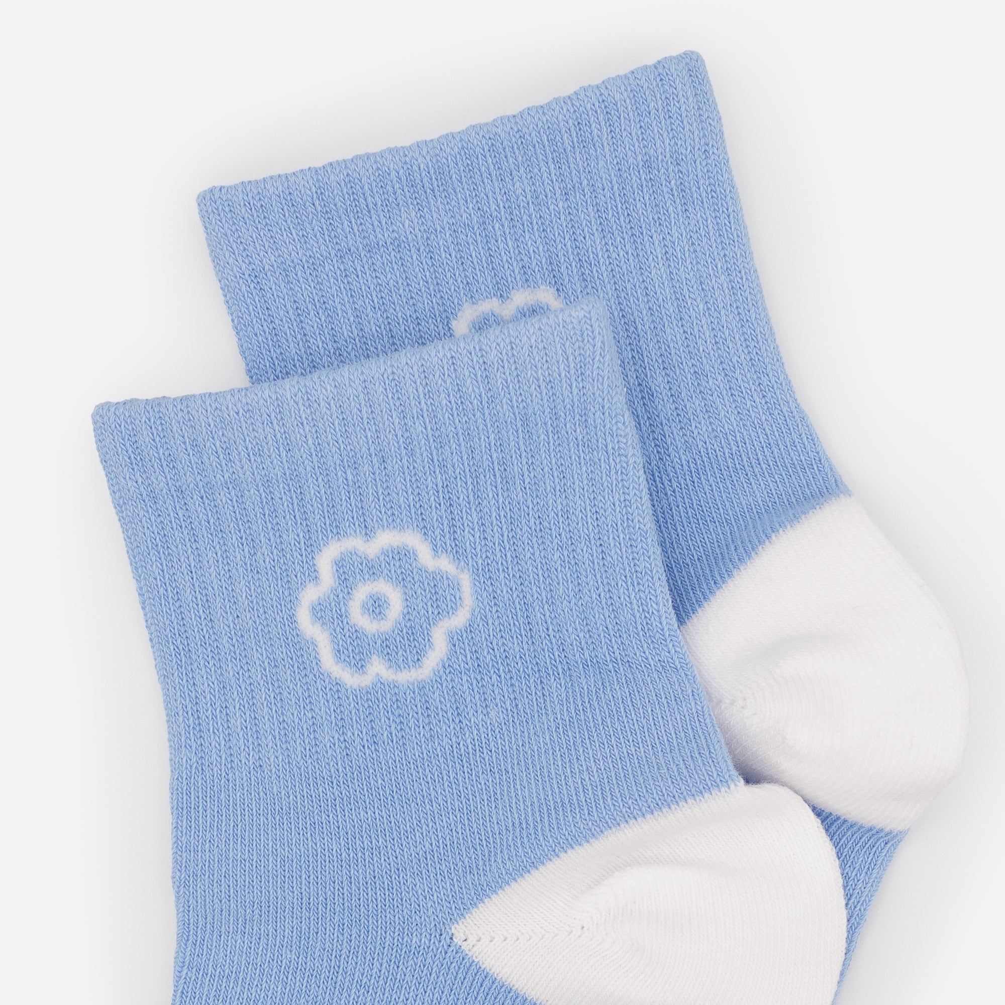 Mid-length pale blue stockings with white empty flowers