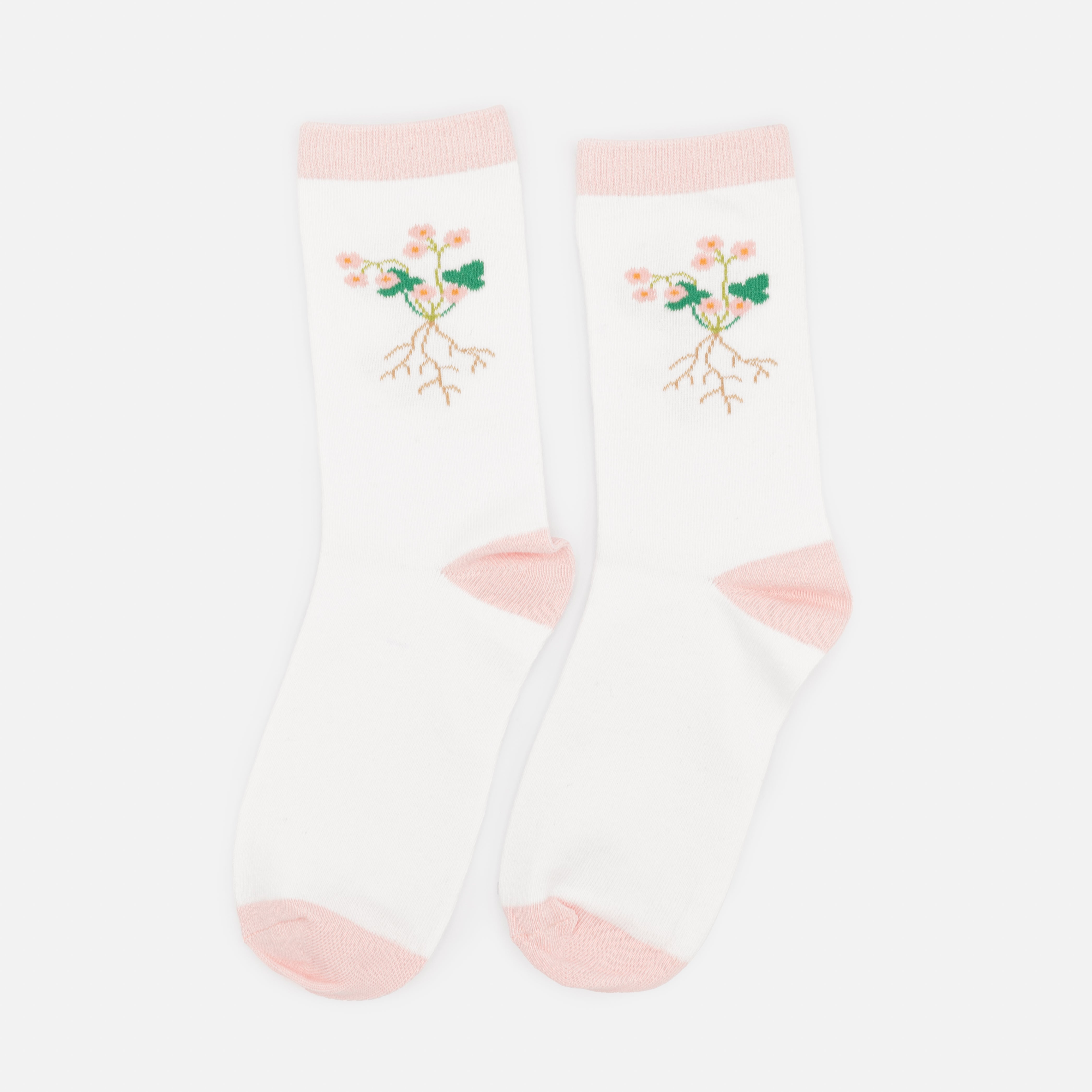 White and pale pink stockings with flower roots