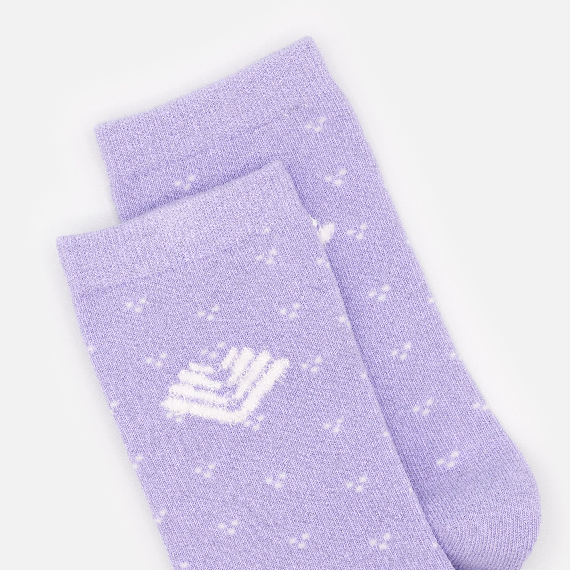 Bas lilas avec motif blanc doux