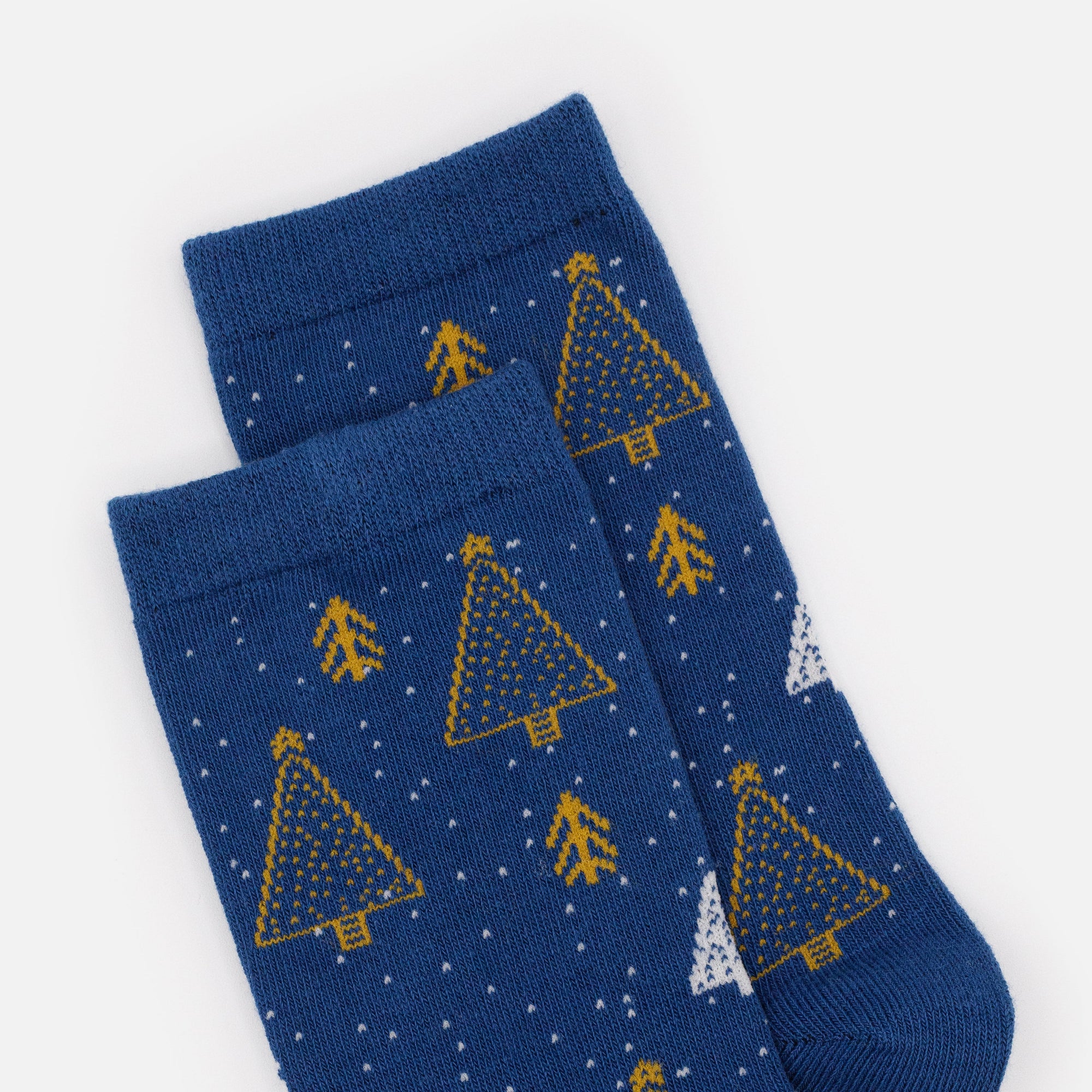 Bas bleu foncé avec sapins dorés