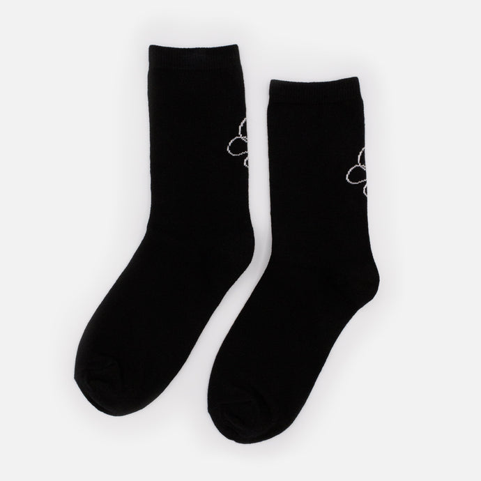 Bas noirs avec imprimé papillon blanc