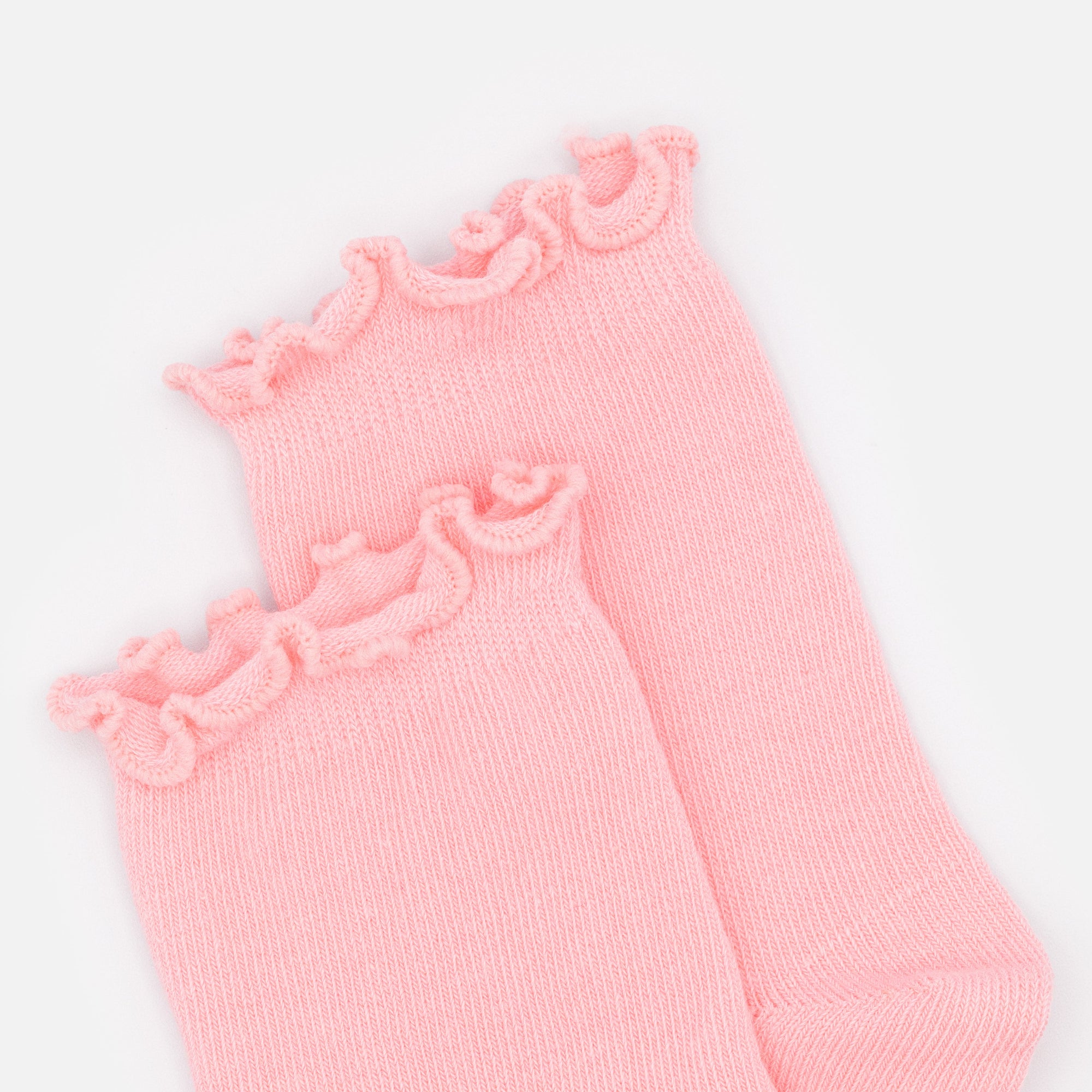 Mini bas cheville rose pâle à bordure ondulée