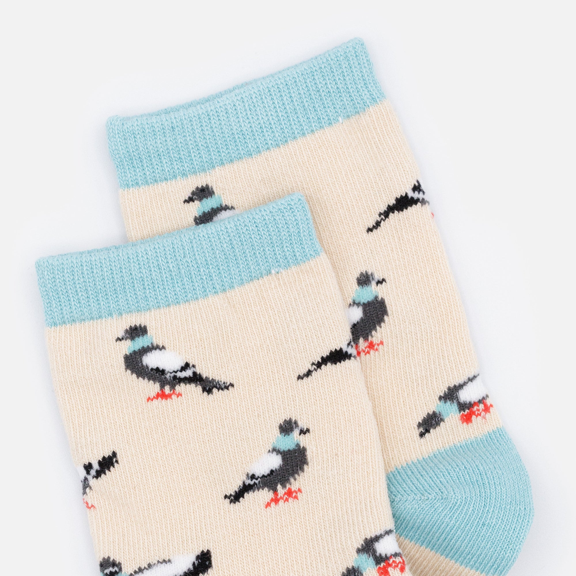 Mini beige and turquoise stockings with pigeons