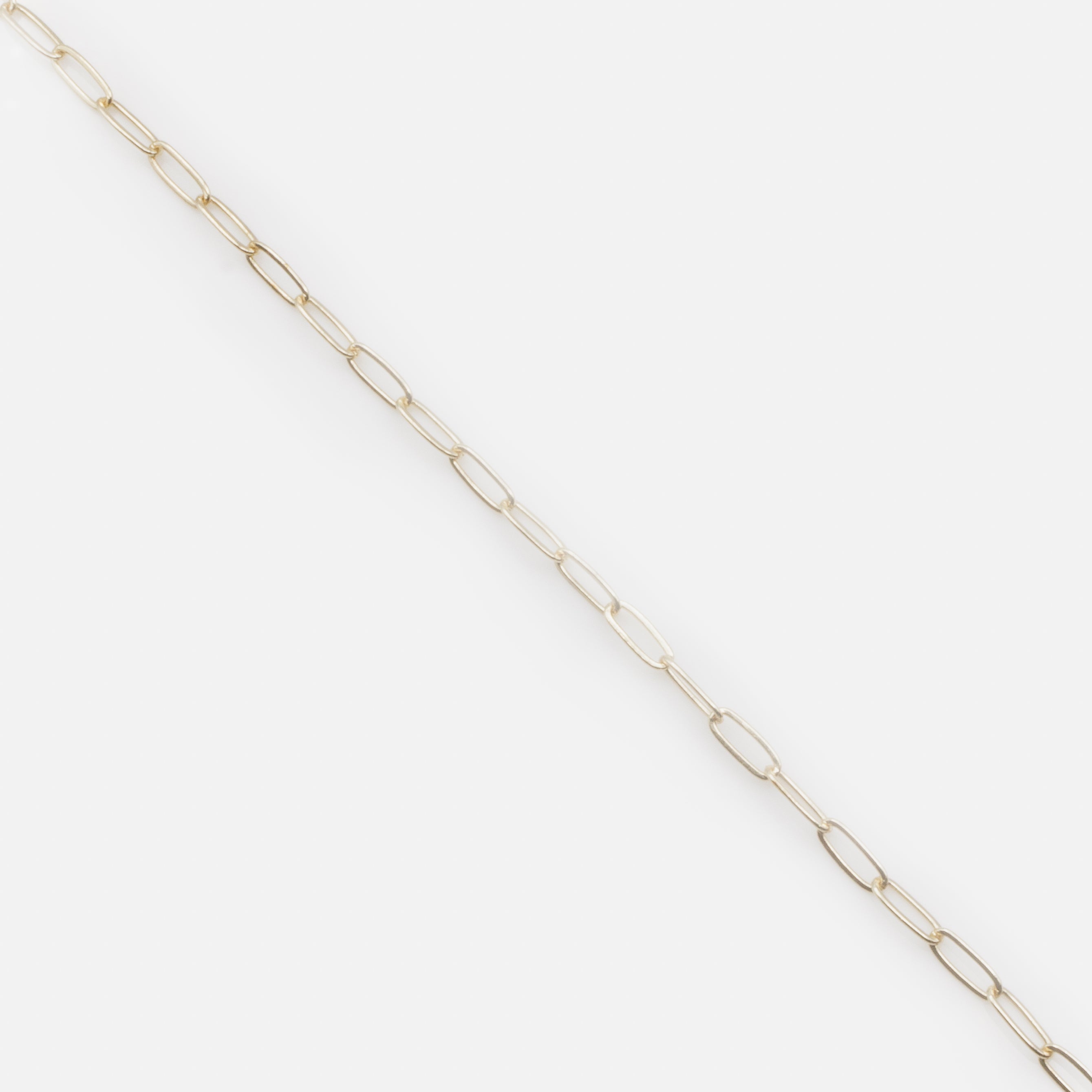 Ensemble trois bracelets dorés perles et billes