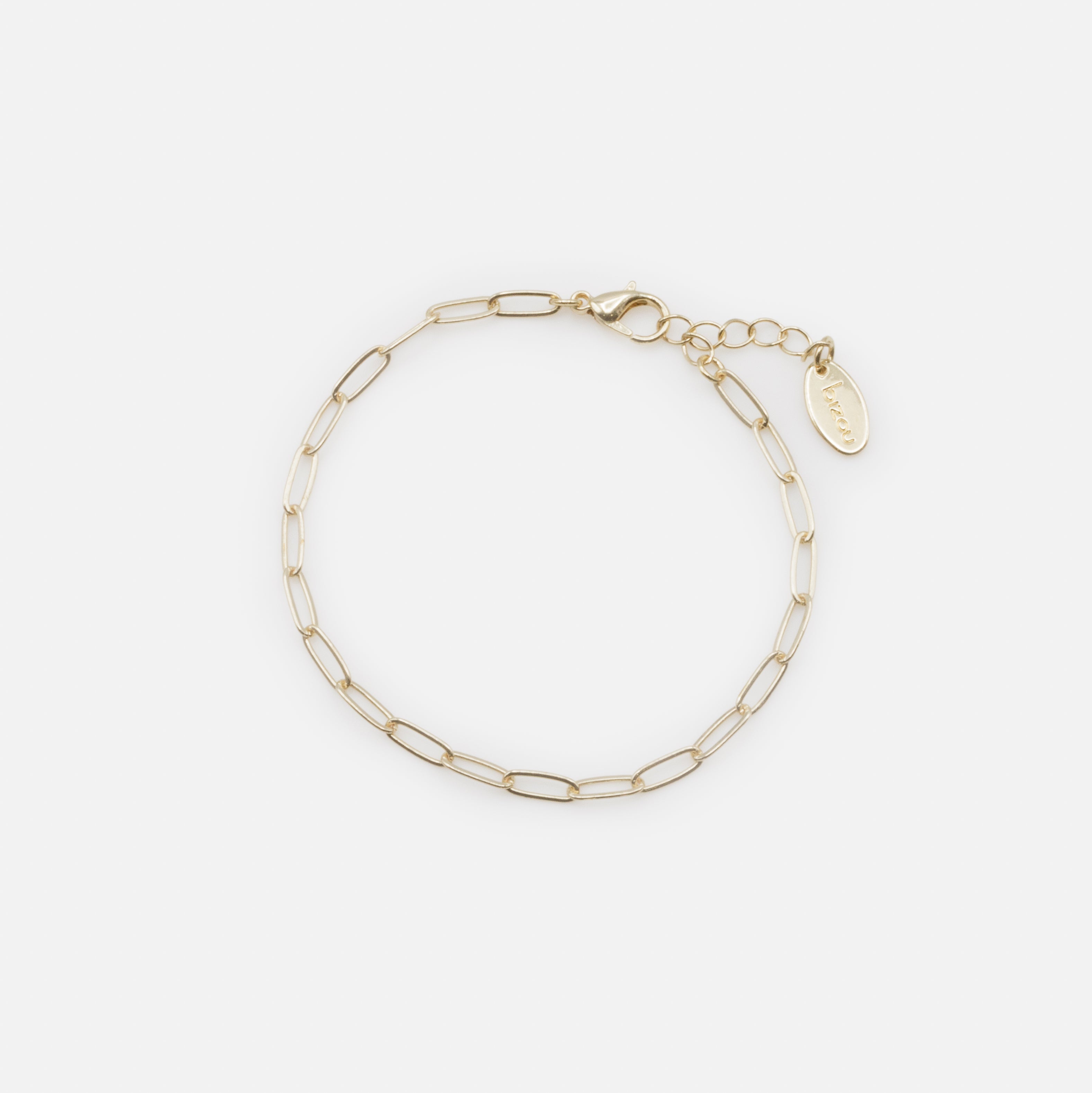 Ensemble trois bracelets dorés perles et billes