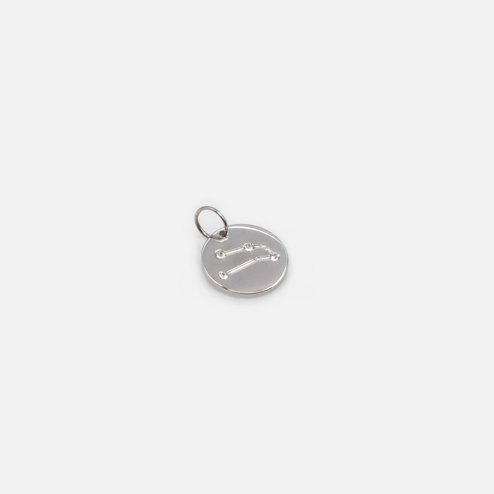 Small silver charm engraved zodiac constellation "taurus"