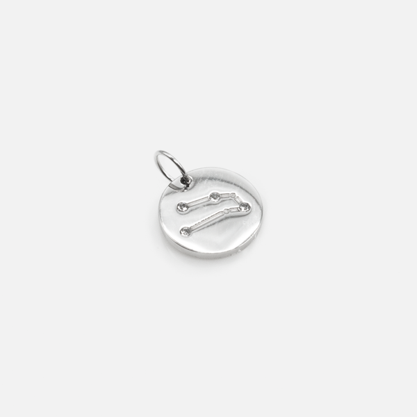 Load image into Gallery viewer, Small silvered charm engraved with the zodiac constellation &quot;taurus&quot;
