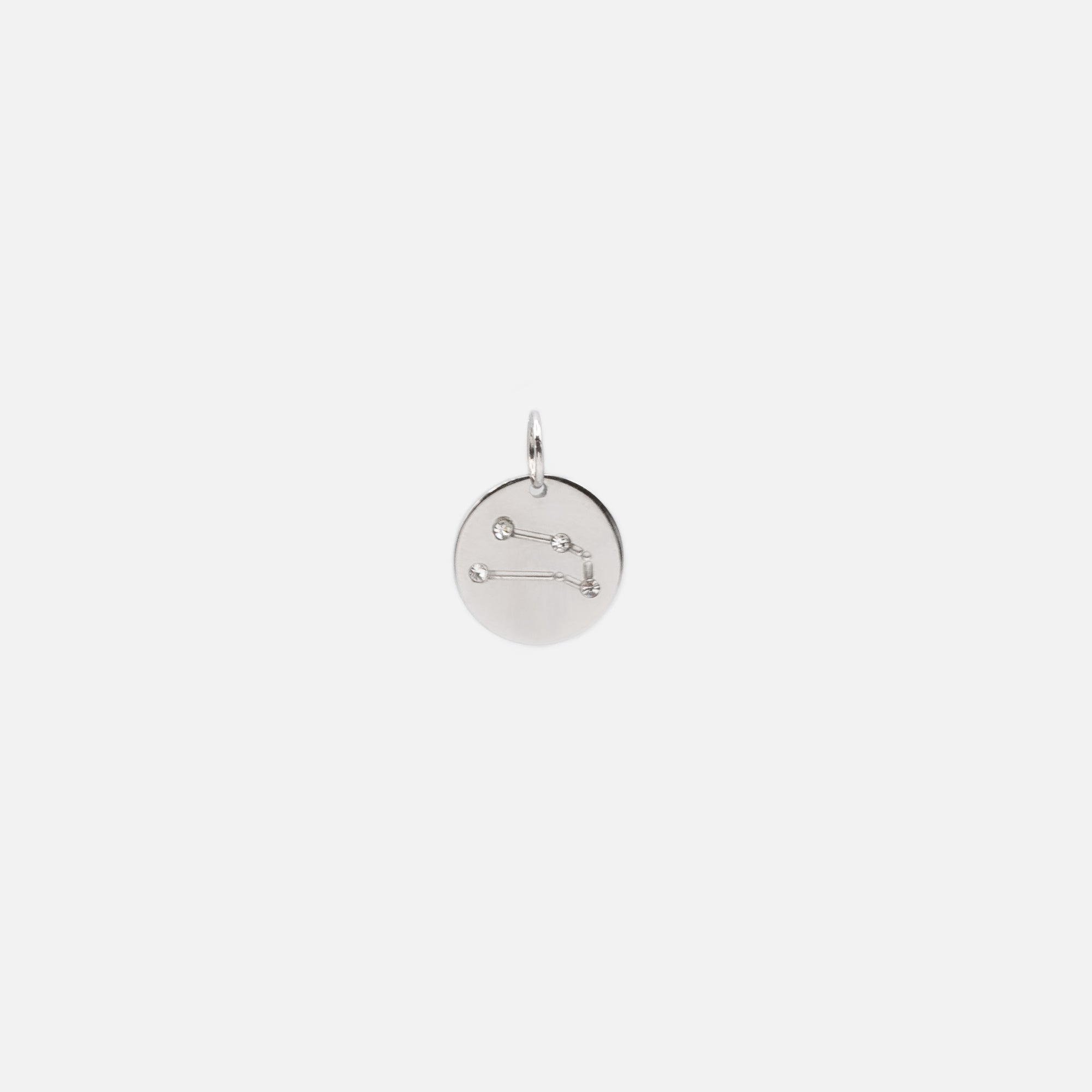 Small silver charm engraved zodiac constellation "taurus"