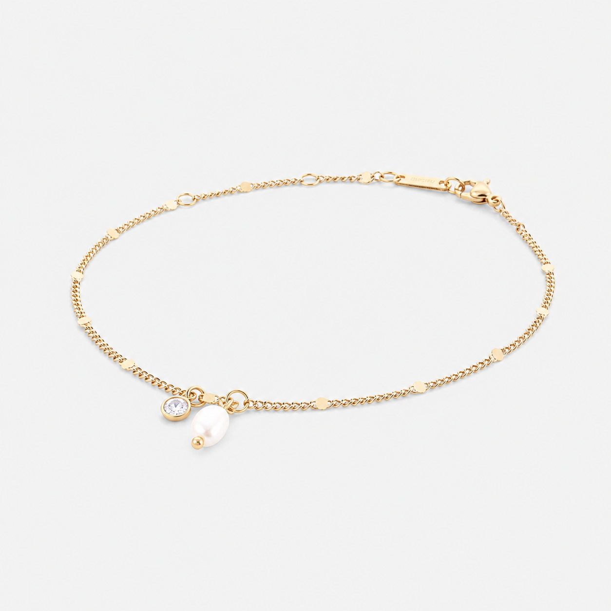 Bracelet doré en acier inoxydable avec pierres et perle