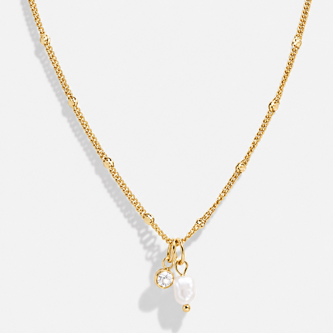 Collier doré en acier inoxydable avec pierre et perle