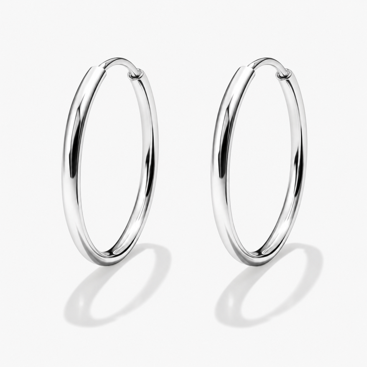 Boucles d'oreilles dormeuses argentées en acier inoxydable