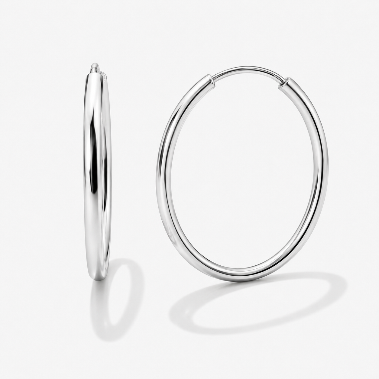 Boucles d'oreilles dormeuses argentées en acier inoxydable