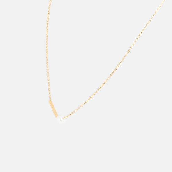 Load image into Gallery viewer, Golden stainless steel necklace with bar and pearl
