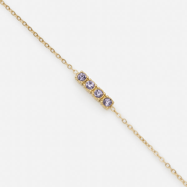 Load image into Gallery viewer, Golden bracelet and its quartet of purple cubic zirconia in stainless steel
