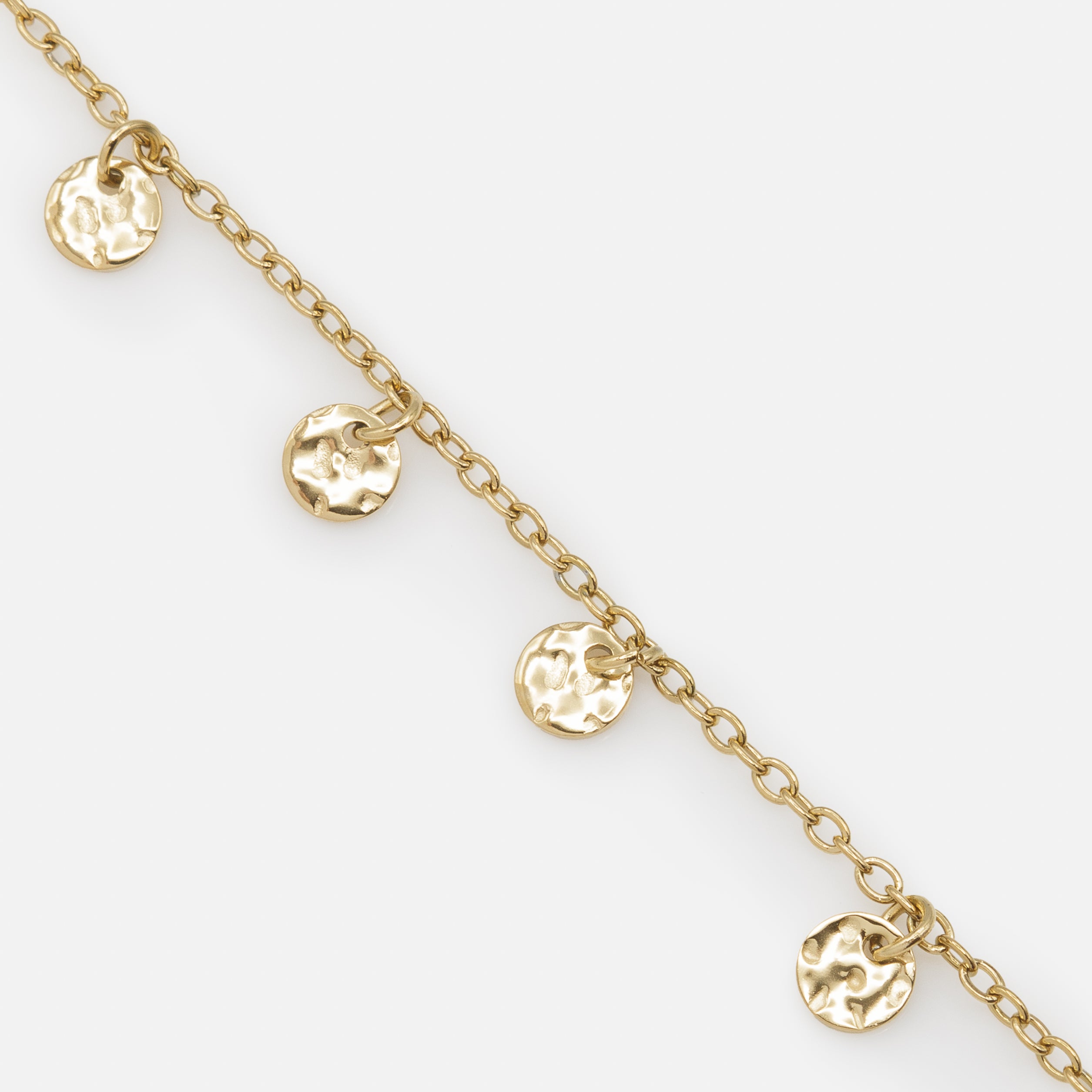 Bracelet doré avec petits disques texturés en acier inoxydable