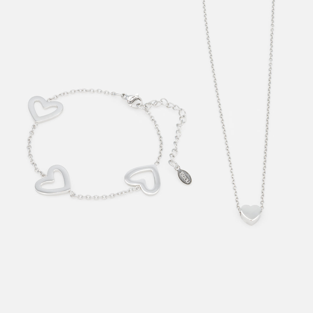 Silver set of small thick heart necklace and large empty hearts bracelet in stainless steel