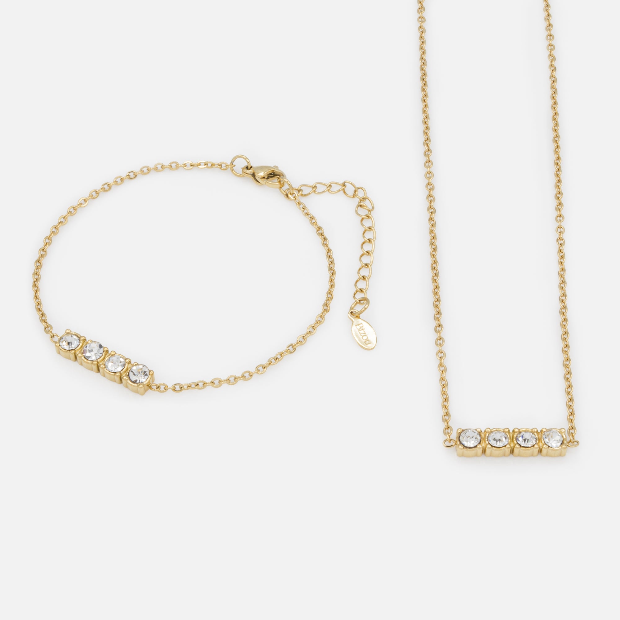 Ensemble collier et bracelet dorés avec quatuor de zircons cubiques en acier inoxydable
