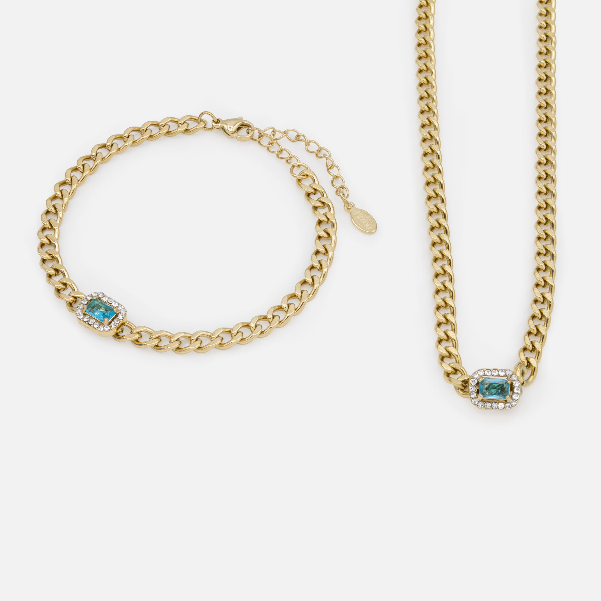 Gold Curb Link Necklace and Bracelet Set with Blue Stone and Cubic Zirconia in Stainless Steel