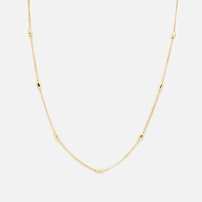 Collier doré à billes allongées en acier inoxydable