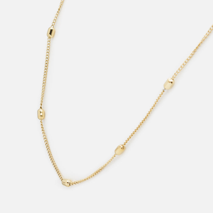 Collier doré à billes allongées en acier inoxydable