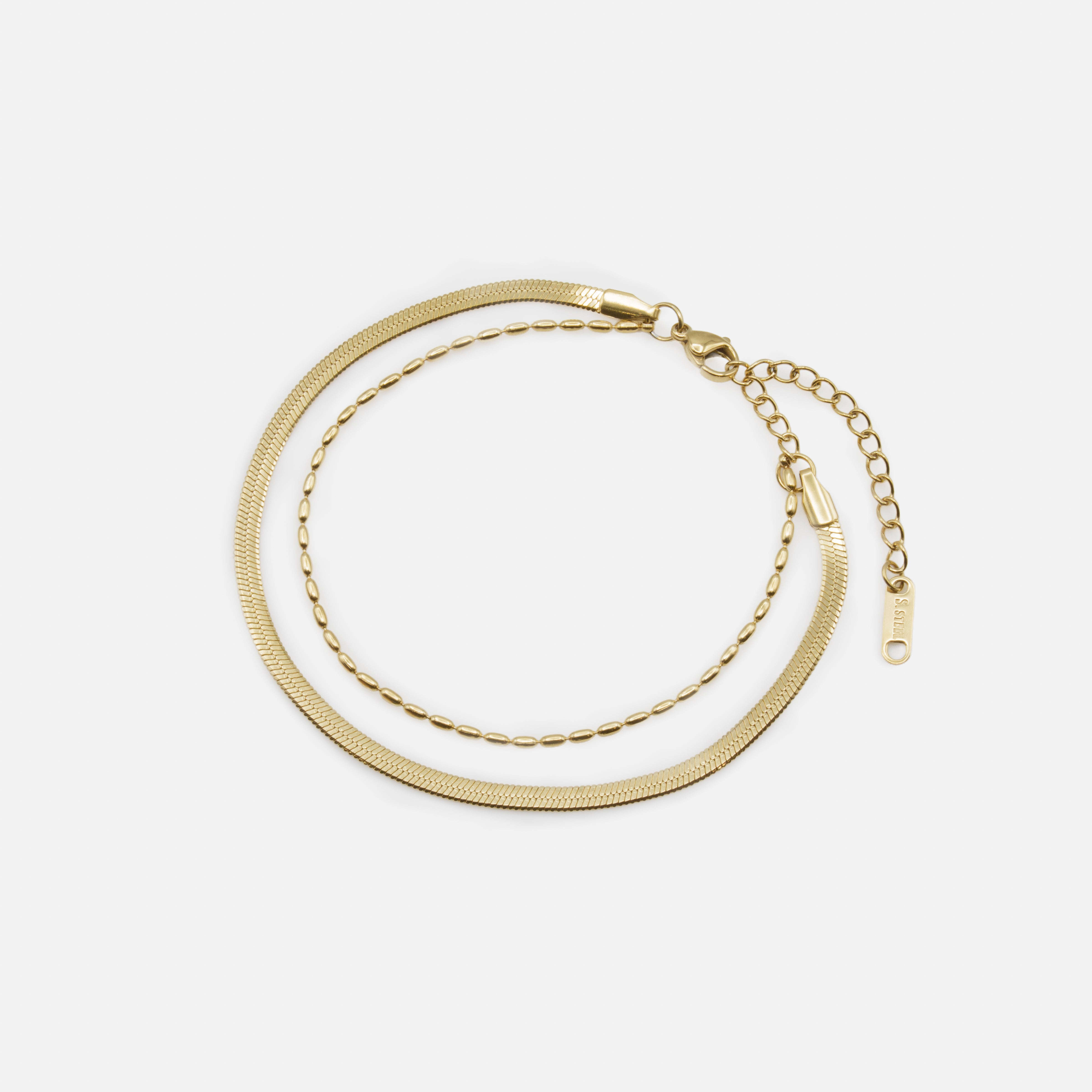 Bracelet doré double chaîne à mailles plates et billes allongées en acier inoxydable