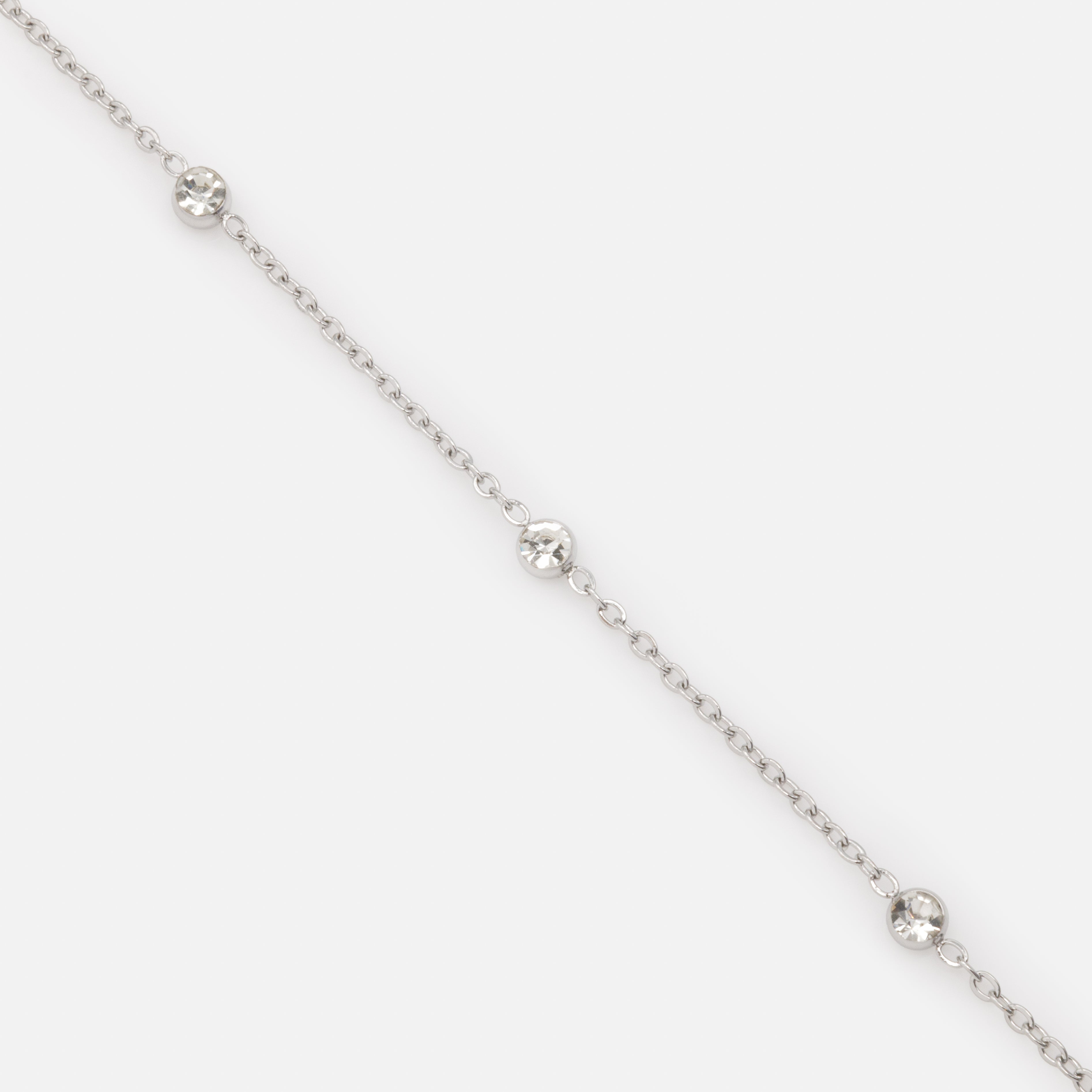 Silver bracelet with trio of cubic zirconia in stainless steel