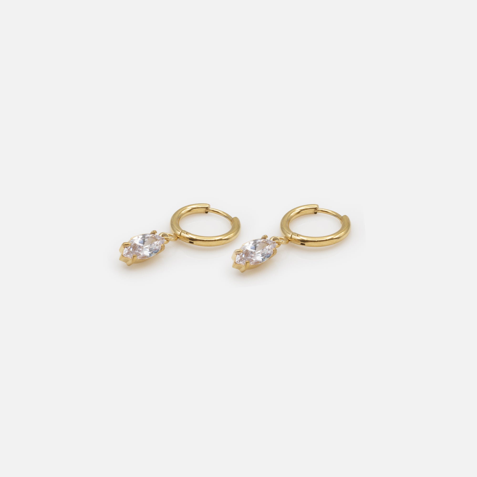 Gold huggies earrings with translucent stone charm in stainless steel