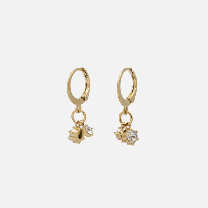 Gold huggies earrings with cubic zirconia charms in stainless steel