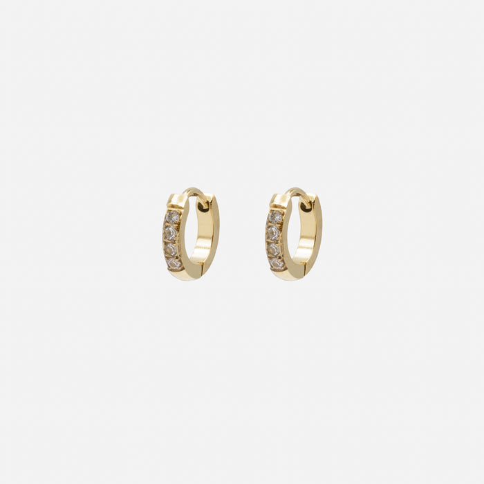 Boucles d'oreilles huggies dorées avec rang de zircons cubiques en acier inoxydable