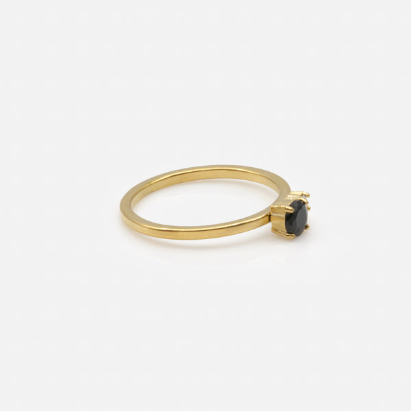 Load image into Gallery viewer, Gold ring with black and translucent zircons in stainless steel
