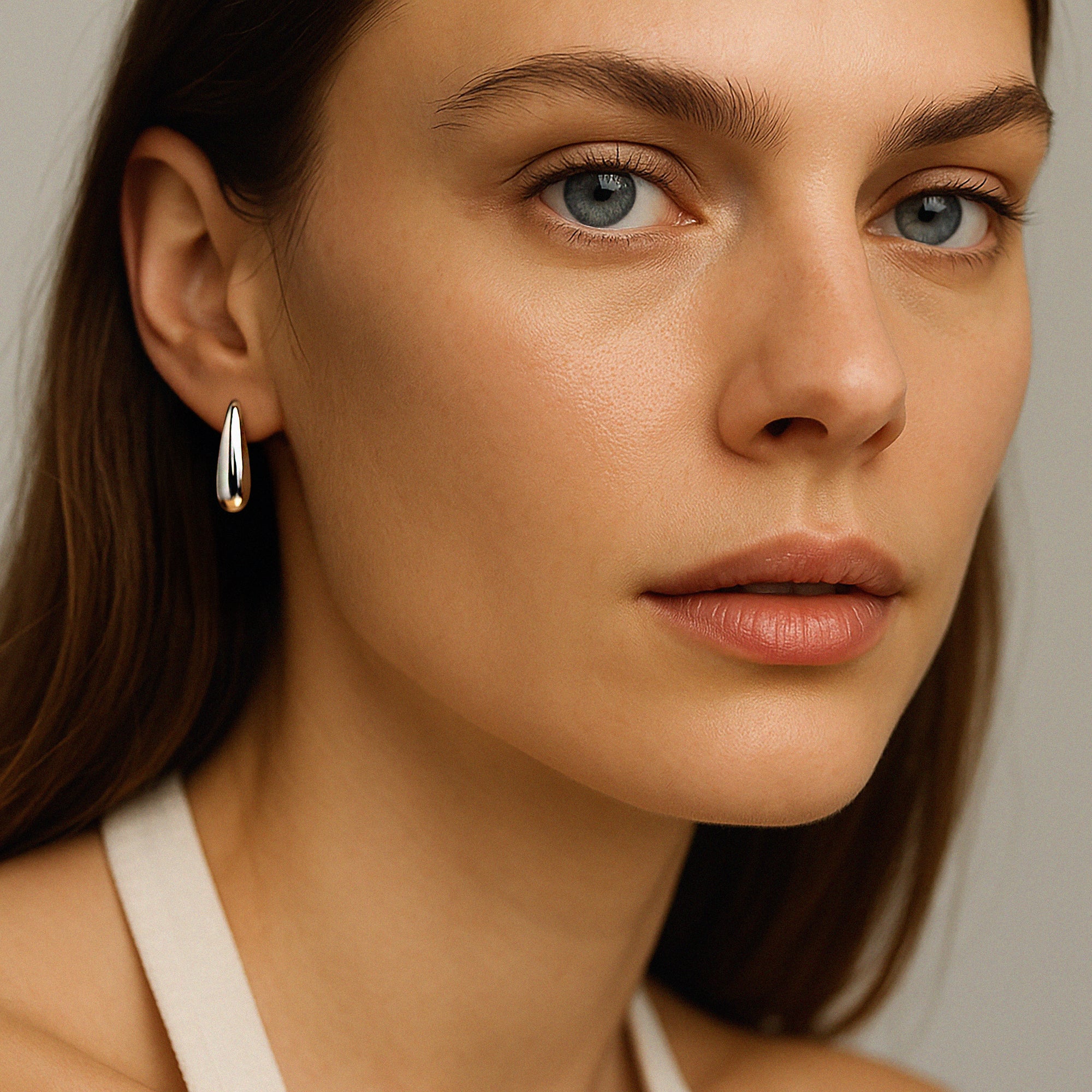 Boucles d'oreilles argentées en forme de goutte en acier inoxydable