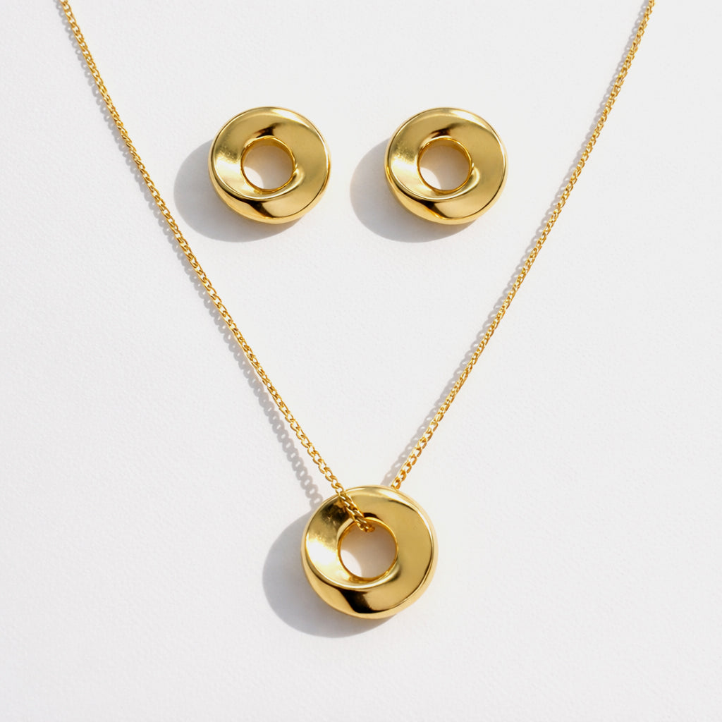 Gold-plated necklace & earrings with large imperfect circles in stainless steel