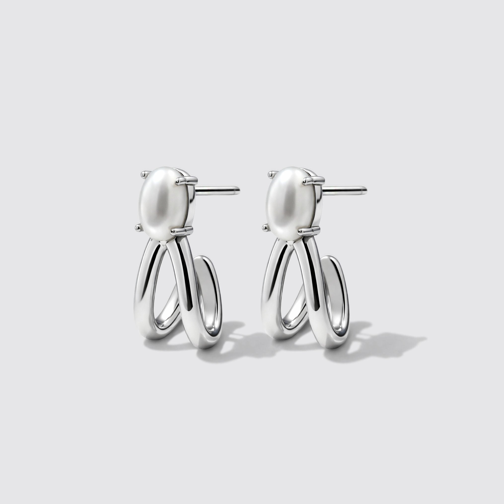 Boucles d'oreilles argentées en acier inoxydable avec perle