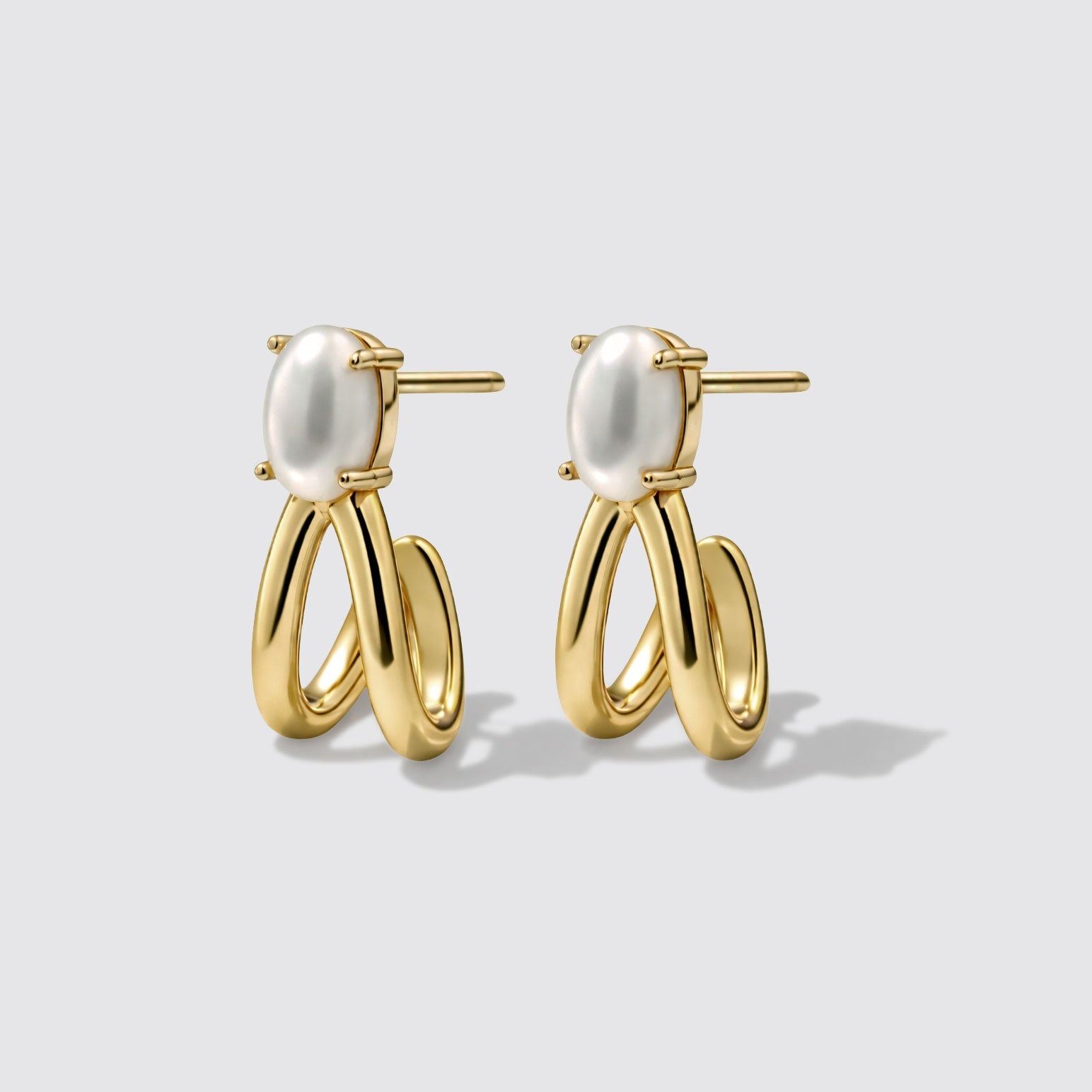 Boucles d'oreilles dorées en acier inoxydable avec perle