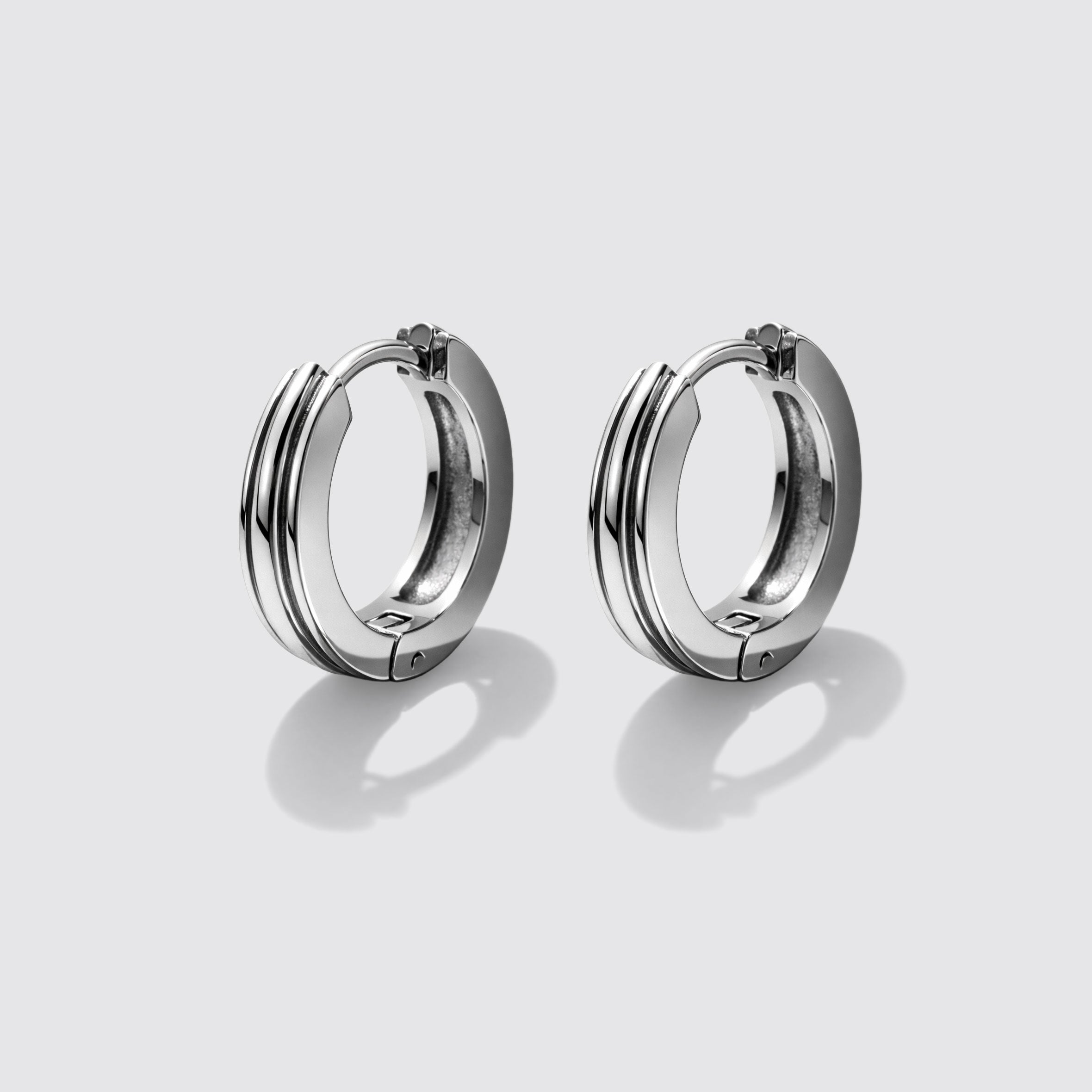 Boucles d'oreilles anneaux argentées à trois rangs en acier inoxydable