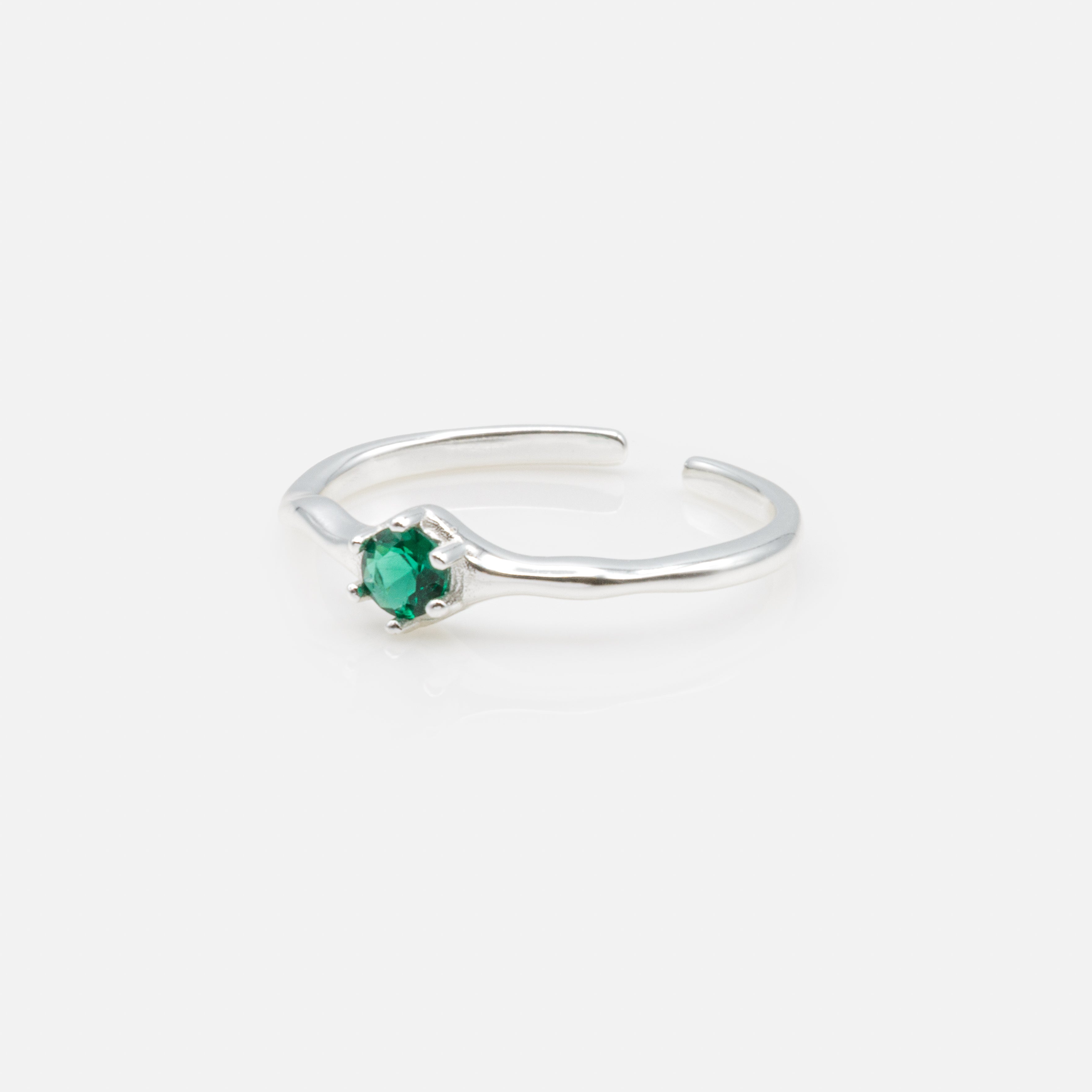 Open ring with emerald stone in sterling silver